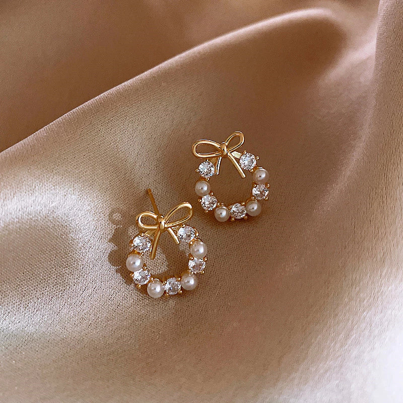 Brinco Lacinho com Pérolas